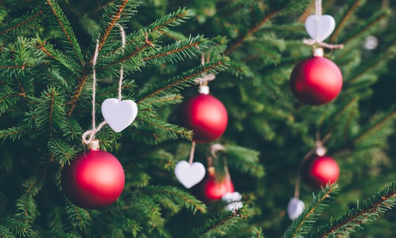 green Christmas tree with red ornaments